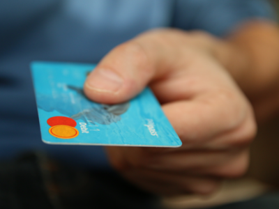photo of someone holding a bank card