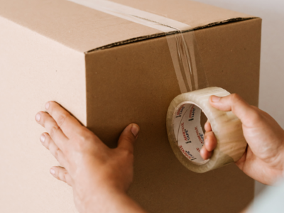photo of closing a cardboard box